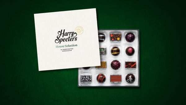 A box of vegan dark chocolates with Harry Specters branding