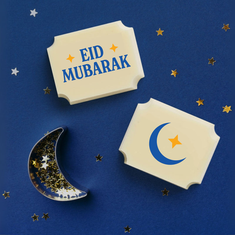 Two luxury white chocolates with an Eid Mubarak message