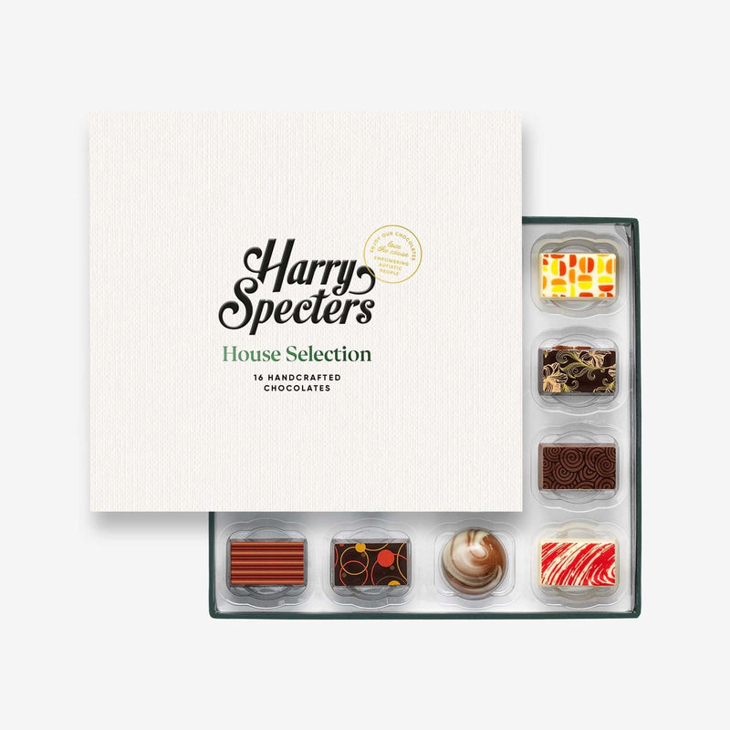 A chocolate box with colourful chocolates peeking out behind a Harry Specters lid