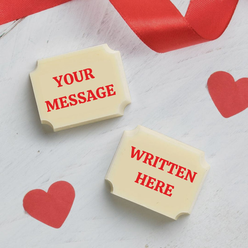 Two personalised Valentine's Day chocolates with 'your message written here'