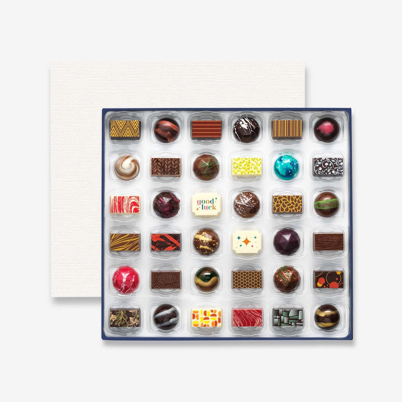 A good luck chocolate box featuring colourful artisan chocolates.