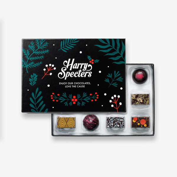 A half closed Christmas chocolate box made with plant-based ingredients